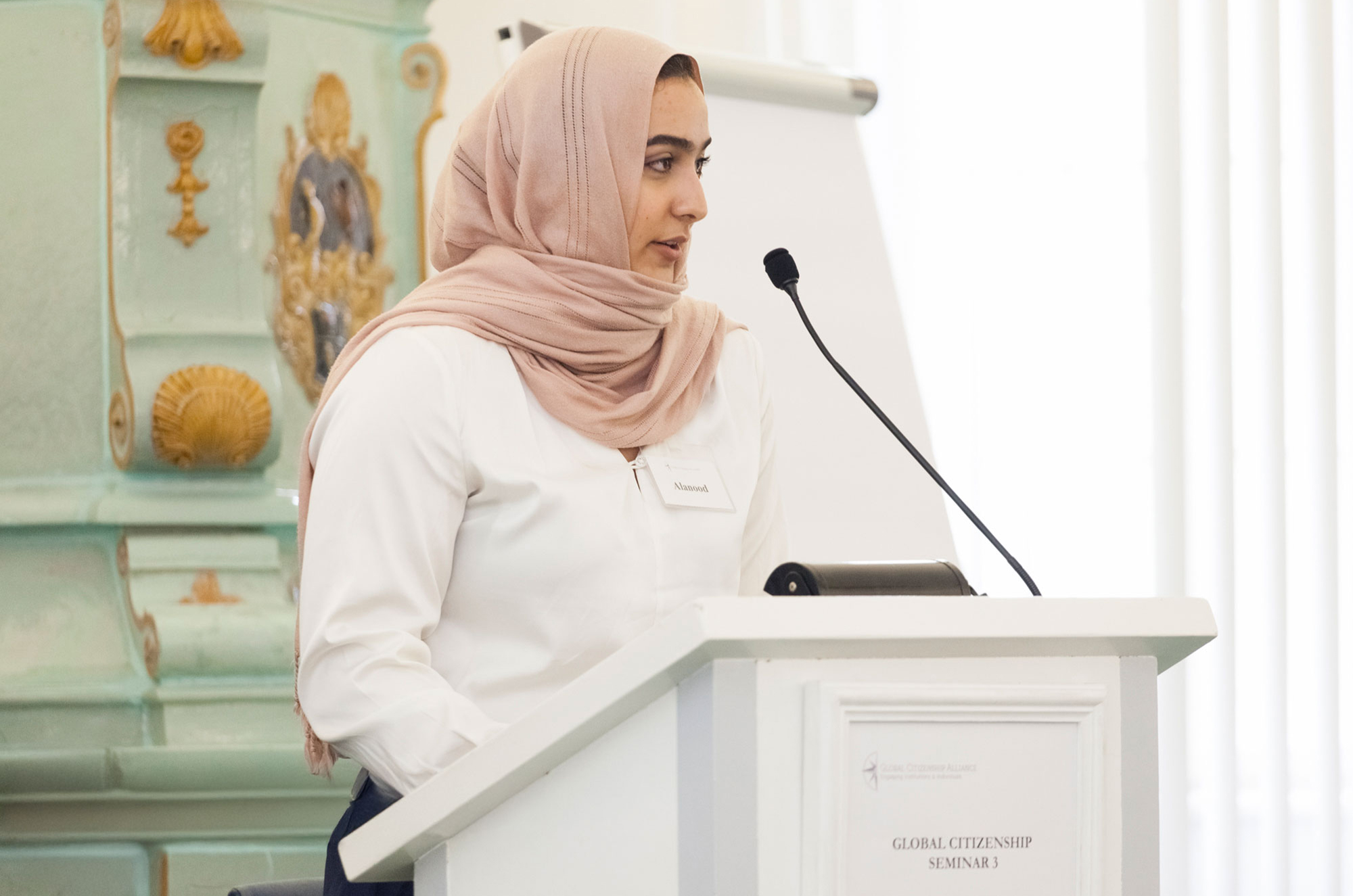 woman giving a speech/ seminar